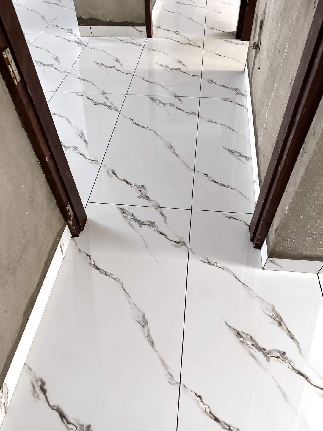 Laser aligned hallway tile installation