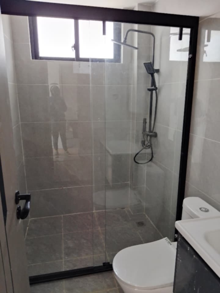 Modern glass shower tile installation